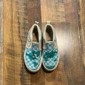 Vans Blue and Tan Sneakers with Classic Slip-On Design
Unisex